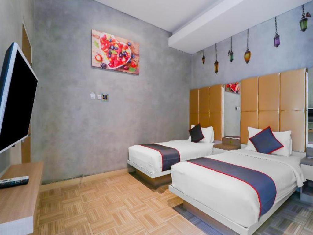 Hotel Collection O 31 The Batik Bed And Coffee Bandung Extérieur photo